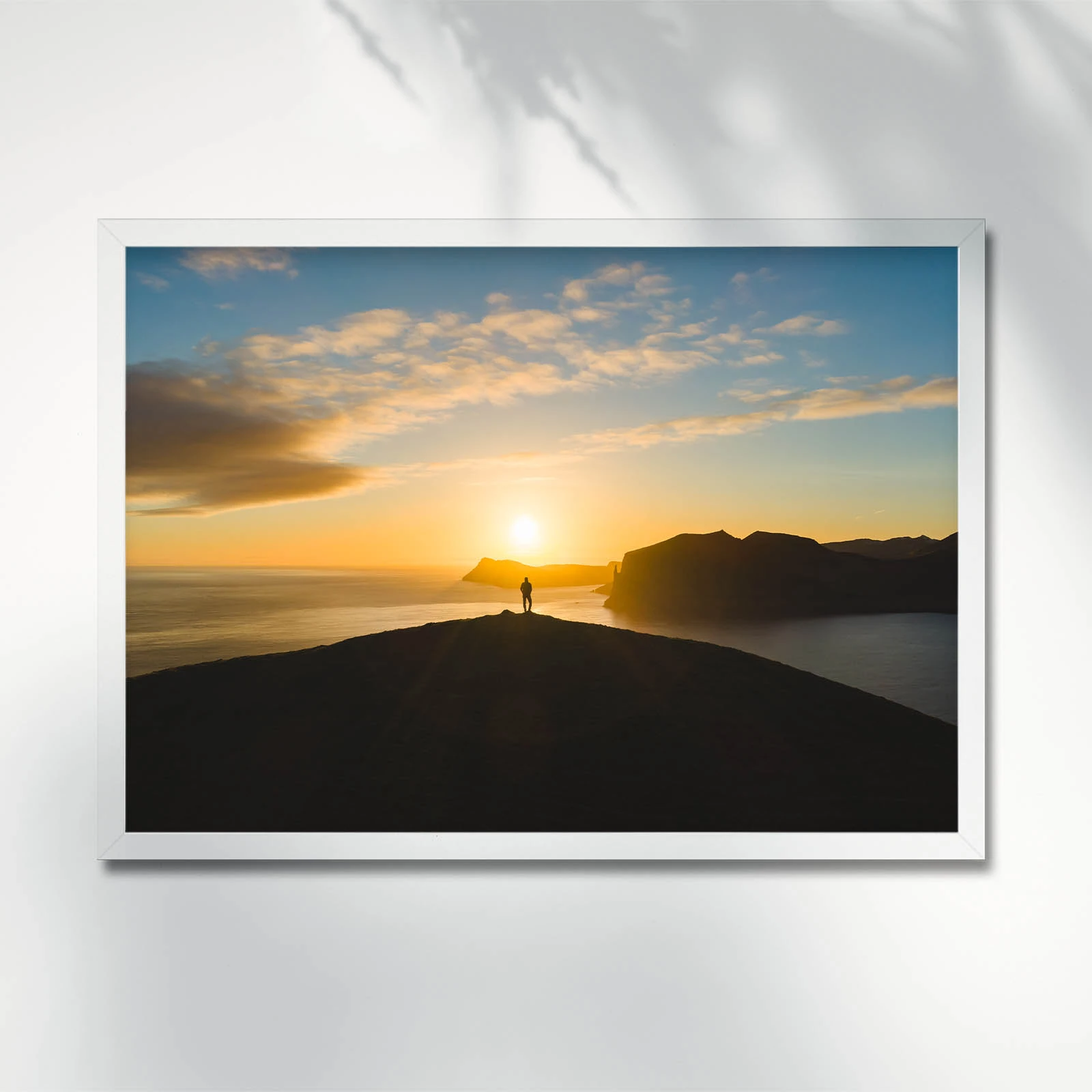 Silhouette against a vibrant sunset. Faroe Islands